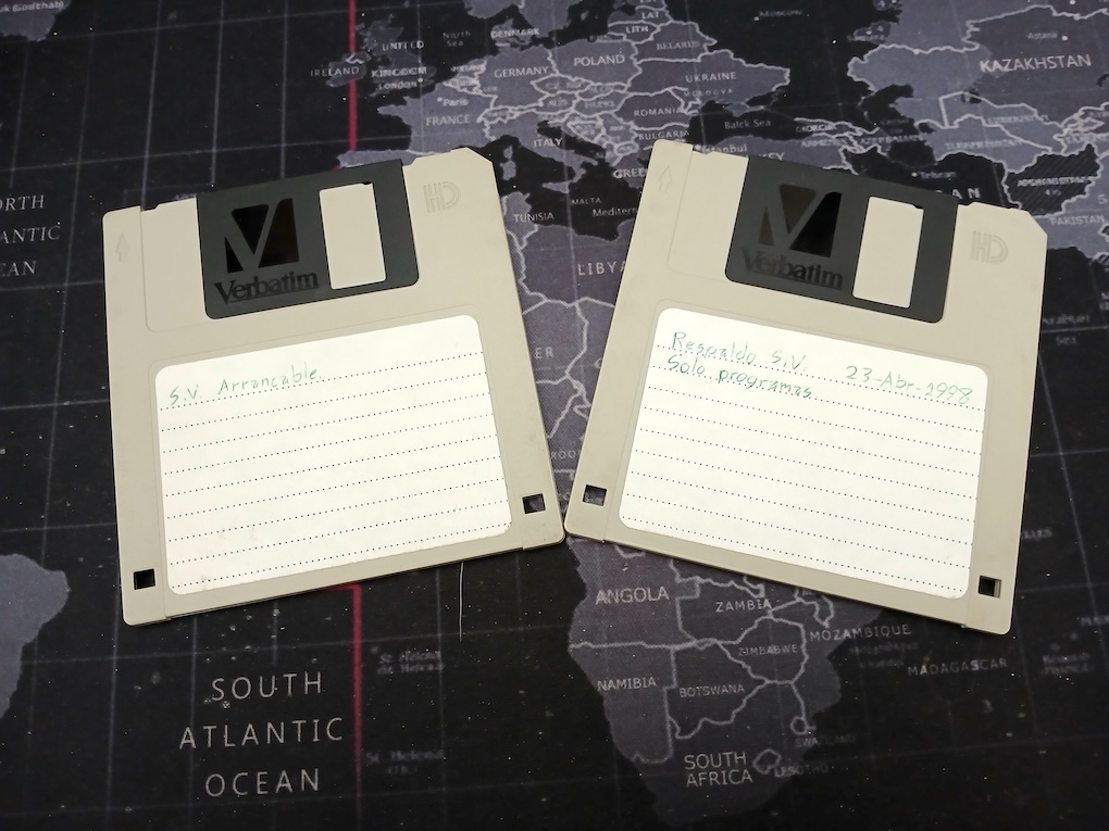 Two floppy disks of 1.44mb capacity with my windowed operating system and programs.