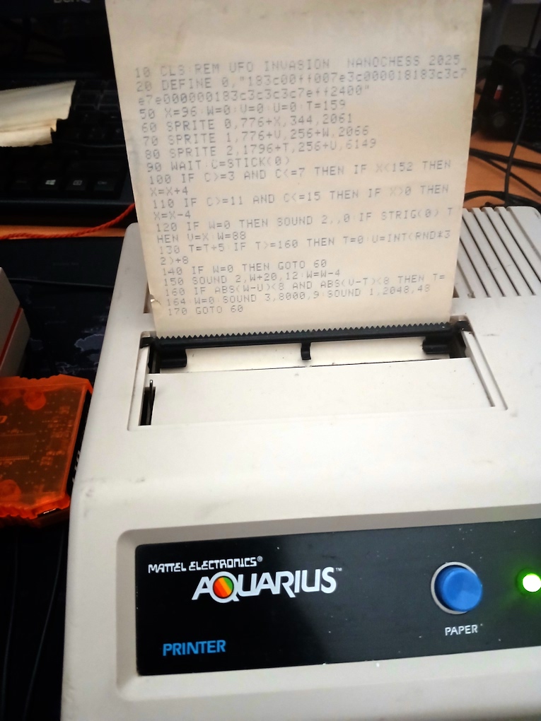 The printed source code of my UFO game. The paper roll is really old.